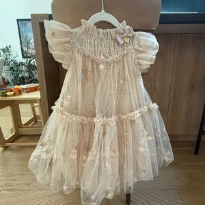 Elegant Cream Tulle Dress with Star Accents